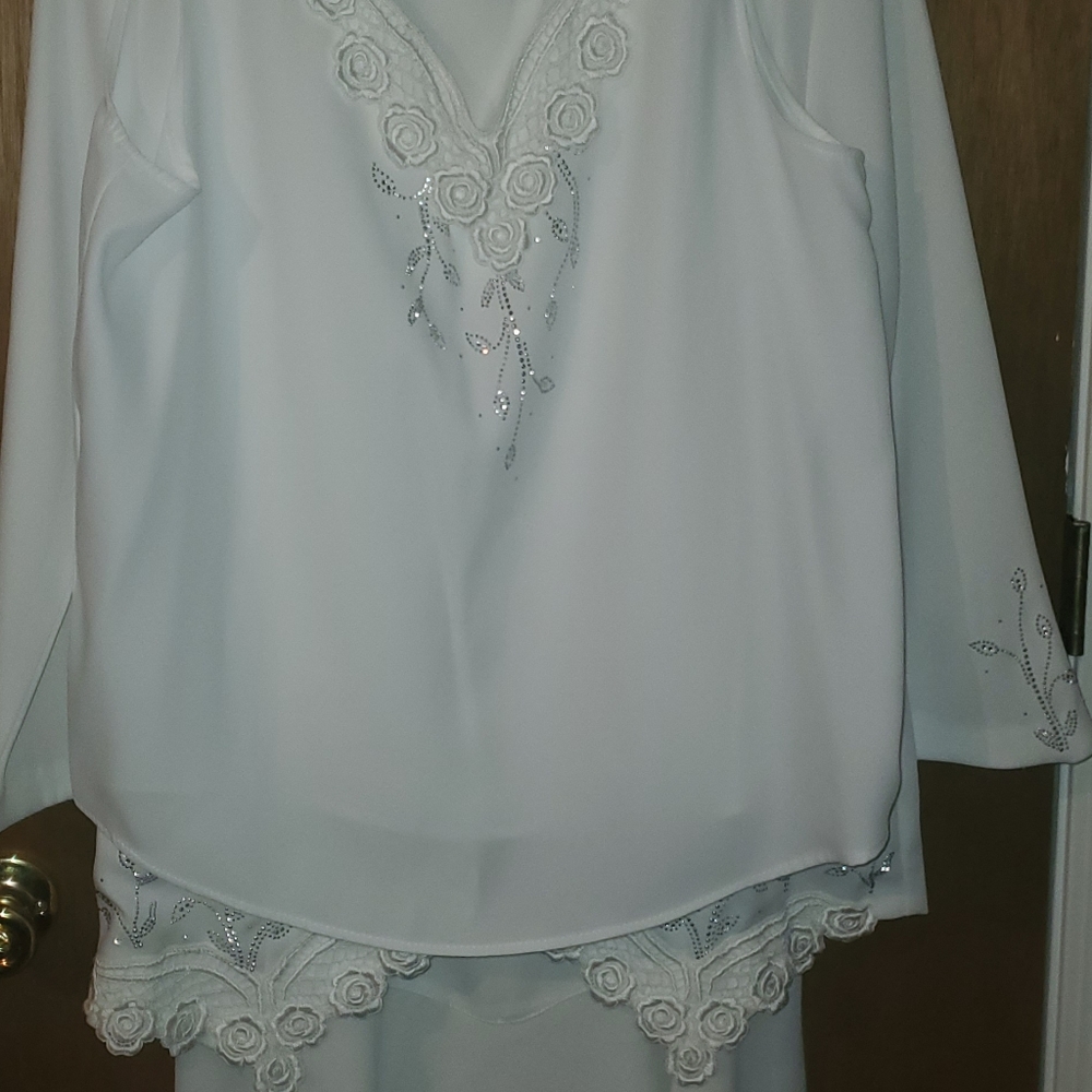 Ivory three piece skirt, jacket, and blouse